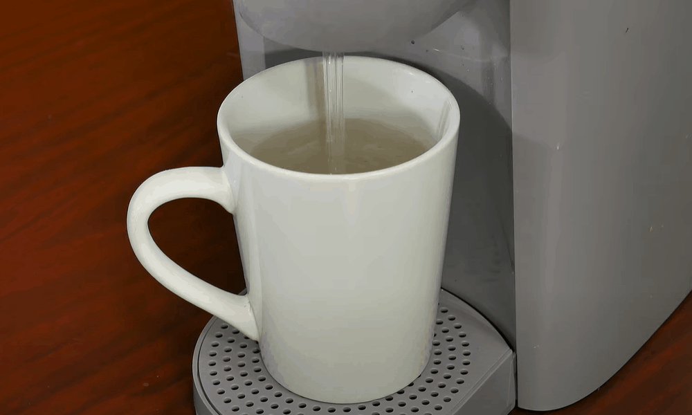 Pour away the hot water from your mug and repeat the process