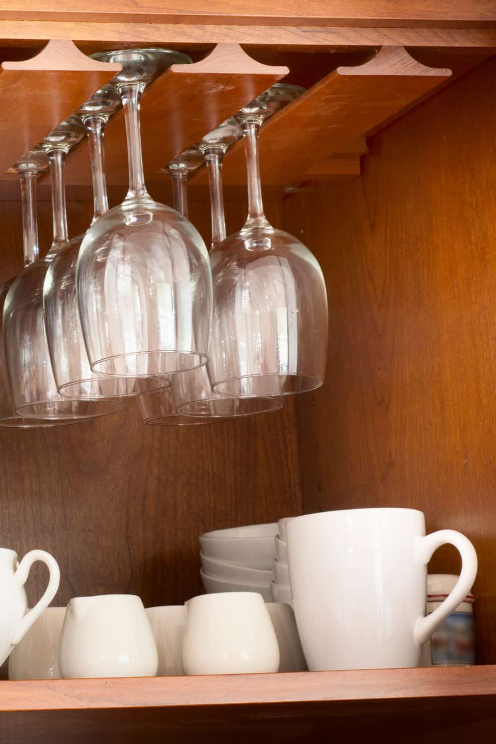 In My One-Room Apartment, My Latest Storage Hack Is a Wall-Mounted Wine Rack That Only Looks Expensive